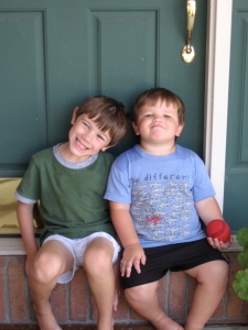 Here is Squishy at age 3. He is on the right with the not-a-smile expression. An expression of wild.